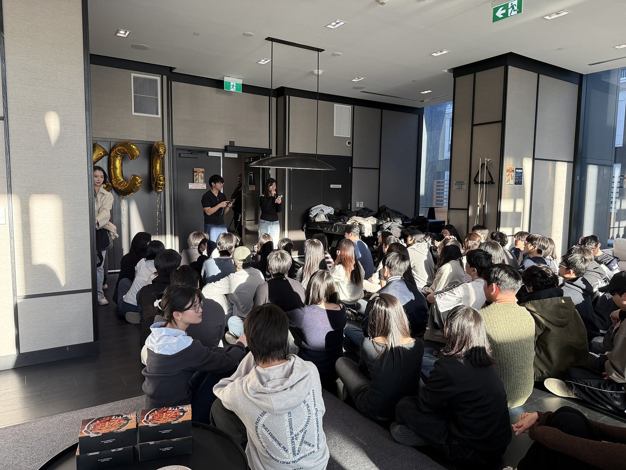 A full room of members at a social night